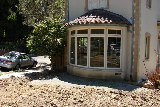 Blighted Yard with Bay Window 