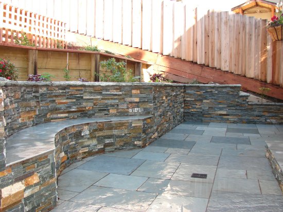 Stone Bench and Integrated Retaining Wall 